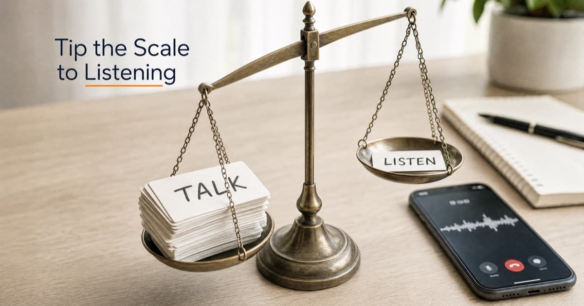 A small desk balance scale tipped heavily toward a stack of cards labeled TALK, with the LISTEN side nearly empty, a phone mid-call blurred in the background